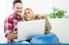internet couple browsing smiling laptop using young cheerful preview