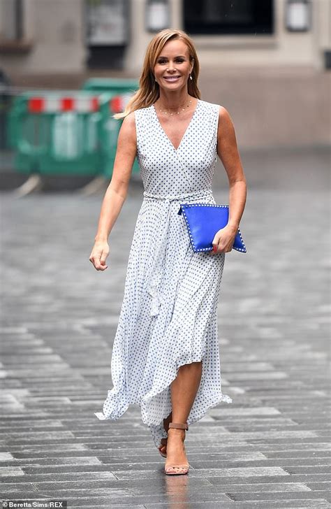 The bgt judge wowed in two stunning looks. Amanda Holden turns heads in a polka dot summer dress as she braves the dreary weather - healthyfrog