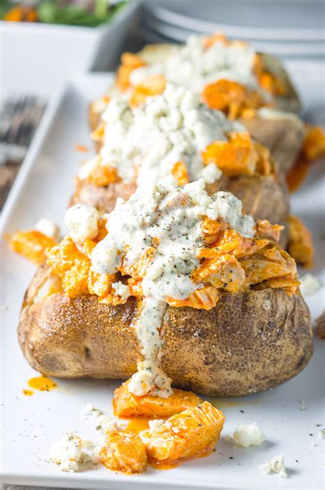 To the baking sheet add all ingredients. Buffalo Chicken Loaded Baked Potato - Bound By Food