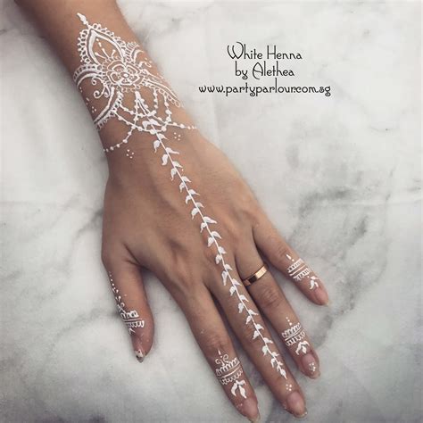 Henna only sits on your skin and isn't actually injected which is a particularly good advantage compared to both white ink and black ink tattoos. Henna Tattoo Singapore | Party Parlour | Party Parlour