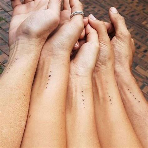 Small tattoos come in cute designs. Rich Small Family Tattoos - Small Family Tattoos - Family Tattoos - MomCanvas