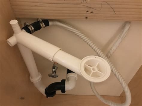 Just turn the disposal until the ell is lined up with wherever the trap ends up. Offset P Trap Sink Question | Terry Love Plumbing Advice ...