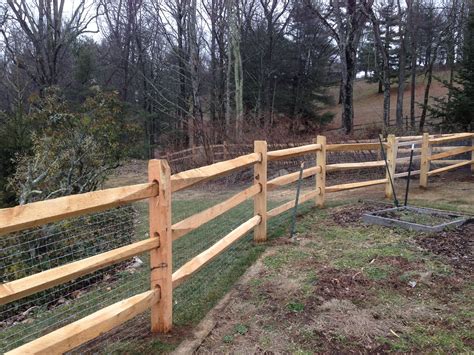 A simple farmhouse with low maintenance landscaping including a well aged split rail fence no more than 3 feet high. Pressure Treated Split Rail Fence Post • Fence Ideas Site