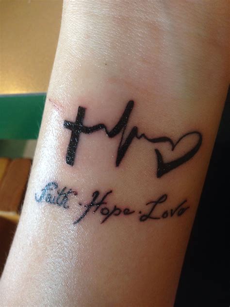 White ink simple cross faith tattoo. Wrist tattoo- faith hope love. | Faith tattoo on wrist, Hope tattoo, Faith tattoo designs