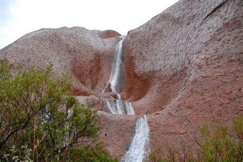 Waterfalls cascading down the sides of uluru on tuesday, june 22. Waterfalls on Uluru: A Rare Sight | Amusing Planet