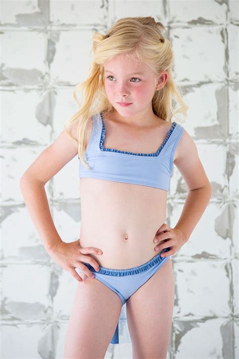 Los bañadores van en talla, por lo tanto tallan. NUECES KIDS GIRLS BLUE BIKINI