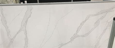 The crisp white background and faint veins and splashes of gold allows this quartz material the flexibility to fit in most spaces. Silestone Calacatta Gold, Eternal Collection by Silestone - Supplier in London UK