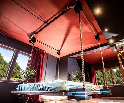 Instead of installing clunking bunk beds, why not hang two beds from the ceiling at once. Retractable Hanging Bed