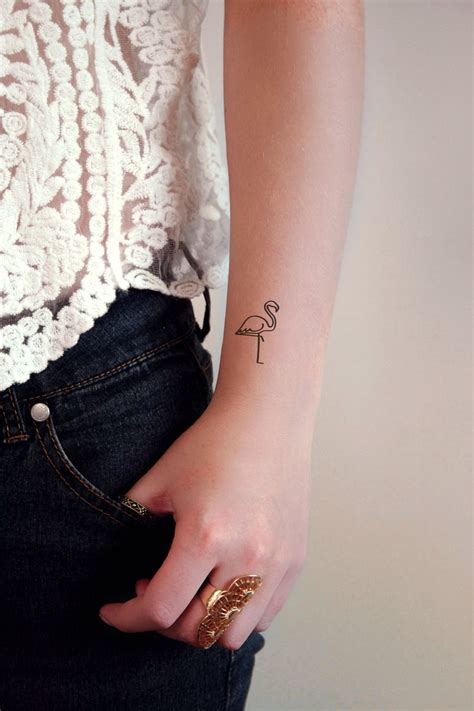 These golden and white tattoos will look good with almost any outfit! Small flamingo temporary tattoo | Boho tattoos, Henna ...