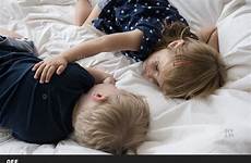 sleeping sister brother bed offset questions any twitter alamy