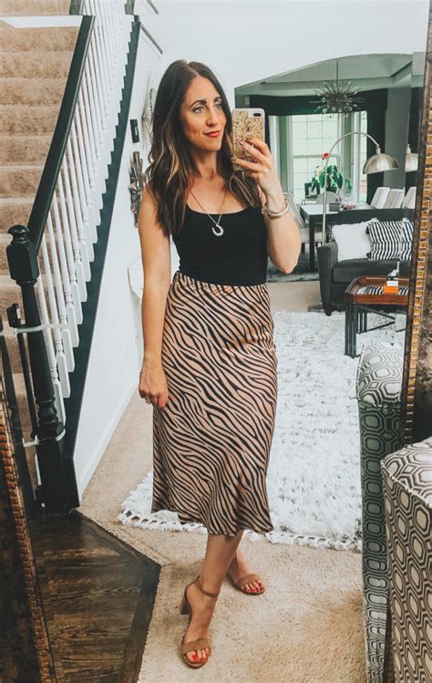 If your midi skirt is in a heavier fabric or a print, i would stick to a more neutral or solid top. 3 Ways to Wear a Satin Midi Skirt | This is our Bliss