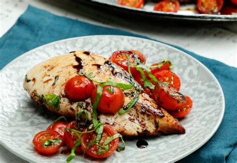 Juicy, flavorful chicken topped with fresh tomatoes, garlic, basil and balsamic glaze, along with a touch of cheese. Bruschetta Chicken - Mealthy.com