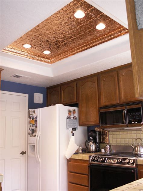 Botanical motifs, scroll work, beading, and other decorative flourishes embossed on real metal panels become a richly textured and enticing focal point in a room. DCT Gallery - Page 5 - Decorative Ceiling Tiles