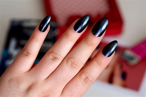 The product works a bit like an eraser. Not Your Average: Elegant Touch Glue on Nails