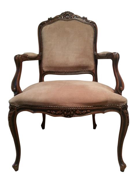 Made from walnut with meticulous detail. French Hollywood Regency Arm Chair | Chairish
