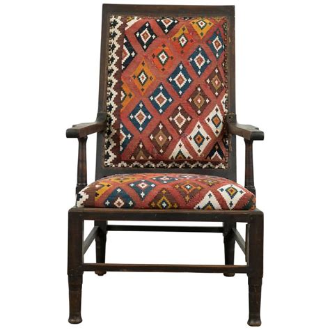 Search all products, brands and retailers of upholstered armchairs: Vintage Indian Armchair Upholstered in Vintage Kilim Rug ...