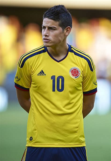 Maybe you would like to learn more about one of these? James Rodriguez of Colombia lines up ahead of the ...