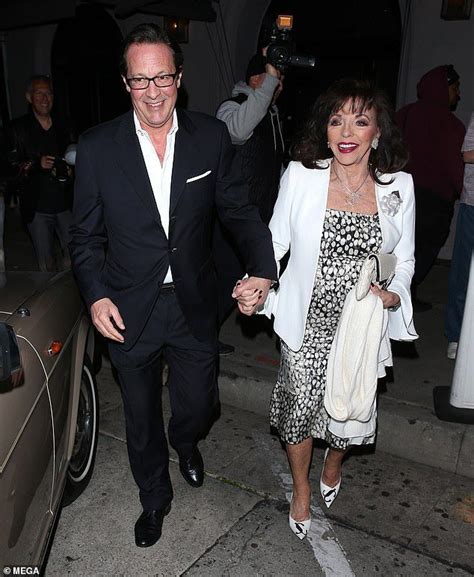 They have been married for a blissful 18 years. Joan Collins, 86, slips on her loafers after glamorous ...