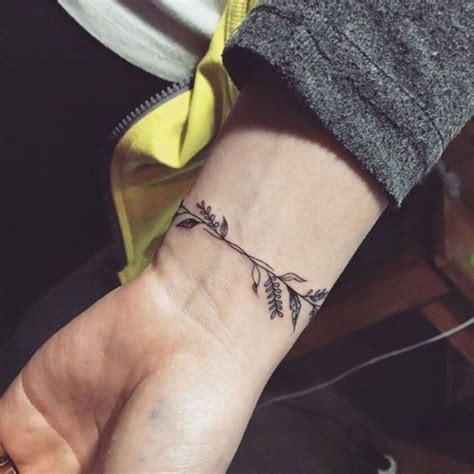 The sad whale wrist tattoo. 35 Insanely Pretty Vine Tattoo Designs You Cannot Ignore