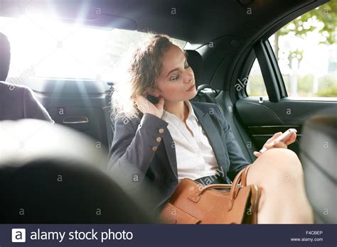 Set a link back to this photo. Inside shot of a car with woman sitting with her eyes closed on Stock Photo: 88782926 - Alamy