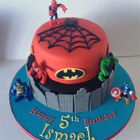 She is also carrying my 1st grandchild. Two tier superhero cake | Superhero cake toppers, Boy ...