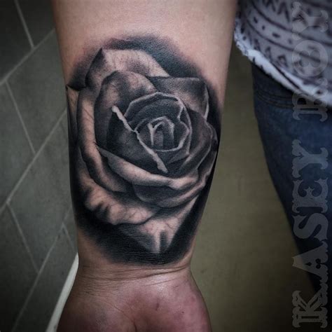 Blooming roses are associated with beauty and hope. Pin on rose tattoo