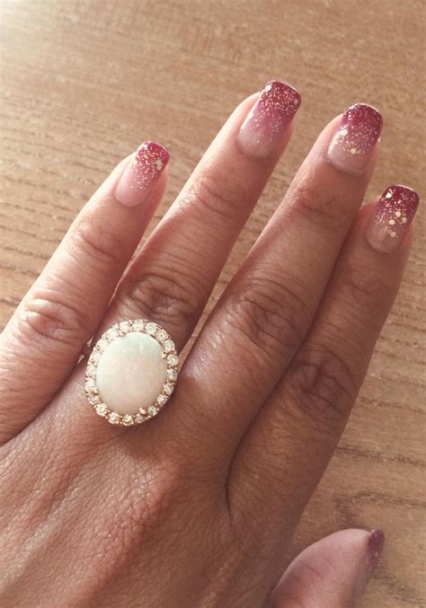 An engagement ring is one of the most important investments you will make in your lifetimewe can help you find and choose the perfect ring for you. 5.00 Carat Opal Diamond Rose Gold Engagement Ring For Sale at 1stdibs