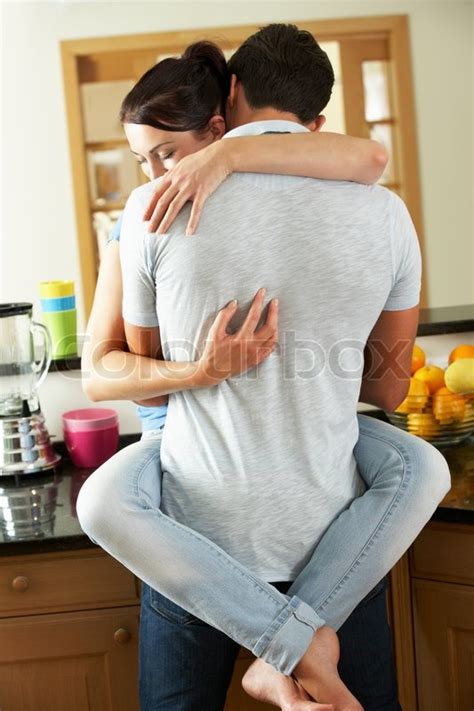 Here are some of their picks, along with several of our favorites! Romantic Couple Hugging In Kitchen | Stock Photo | Colourbox