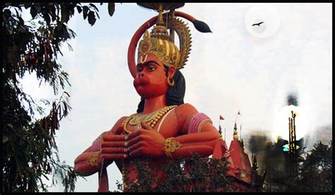 You are currently converting distance and length units from inches to feet. 108 feet Hanuman Temple in Delhi India