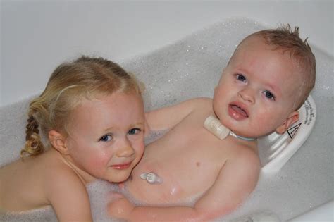 The basics of baby bathtubs. siblings of kids with tracheostomy | Liam with his big ...