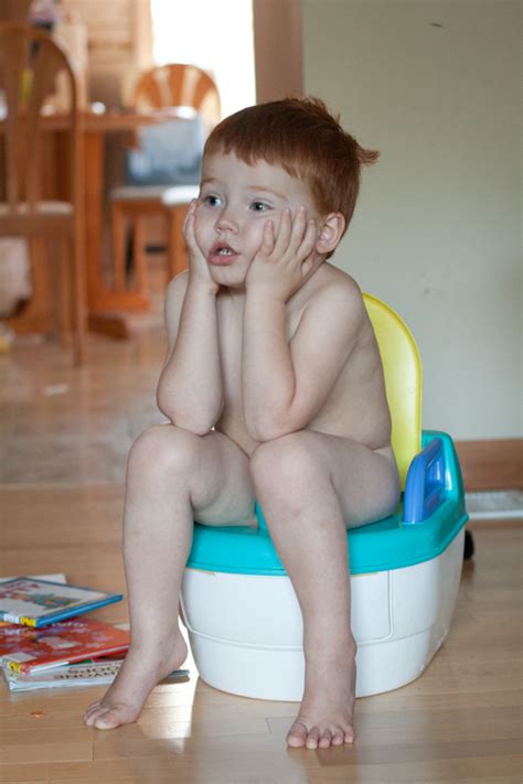 Introduce potty training as early as is reasonable. Three red heads and a couple blondes: Potty training Mason