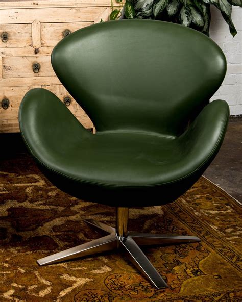 Evolving from jacobsen's search for a curved fluid form which required. Mid-century style "swan" chair, covered in pine green ...