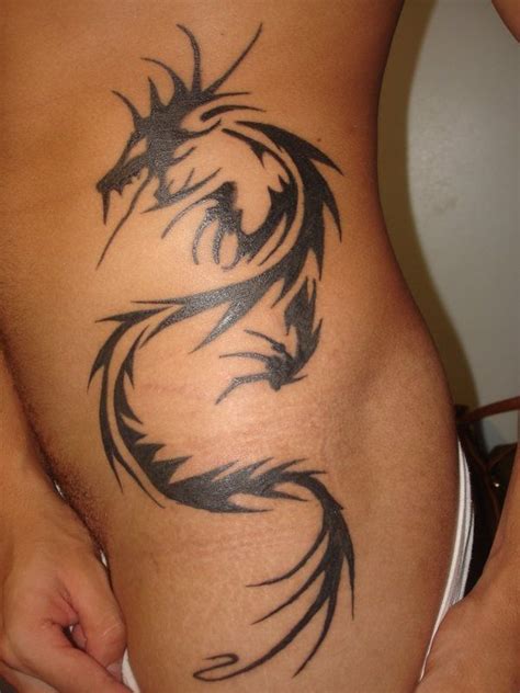 You need to possess extreme enthusiasm and conviction for tattoo art to sport a great looking sidepiece. Cool Dragon Tattoo Tribal on Side for Women | Tattoos for ...