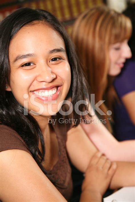Cute Smiling College Student In Front Of Fellow Students Stock Photo Royalty Free Freeimages