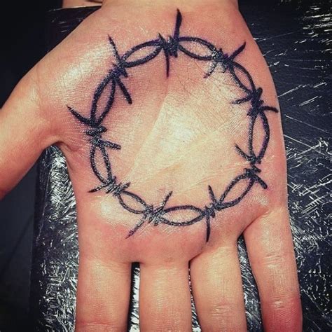 Beautiful barbed wire tattoo on muscles. 60 Barbed Wire Tattoo Designs For Men - Cut Into Ideas
