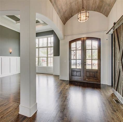 The wooden kitchen island matches the shiny wooden flooring. House remodel inspiration. | Barrel ceiling, Home, Barrel ...