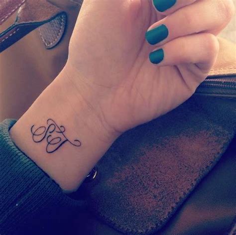 See more ideas about tattoos, initial wrist tattoos, tattoos for women. Initial Wrist Tattoo Design With The Best Ideas Of Initial ...