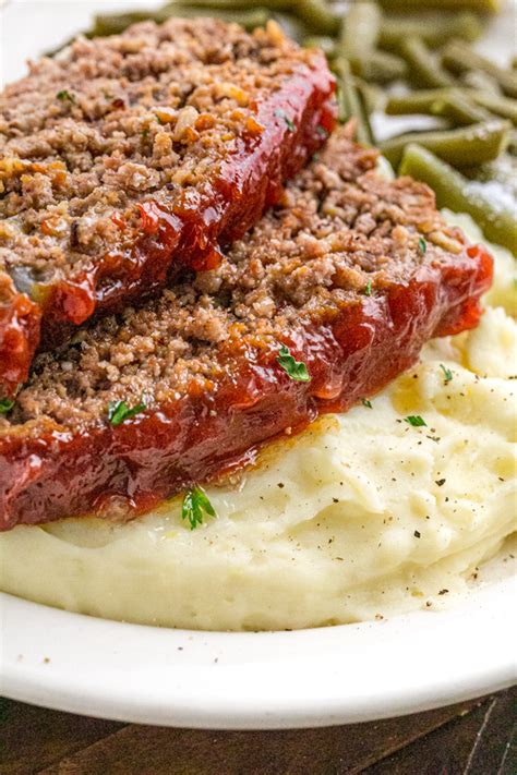 But if it browns too quickly, just pop foil over it. 2 Lb Meatloaf Recipe With Milk : Mom's Meatloaf | Plain Chicken® : Keeps the meatloaf both dense ...
