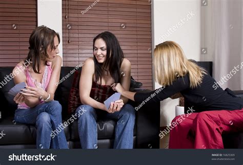 Four in a line rules. Three Attractive Girls Playing Strip Poker Stock Photo ...