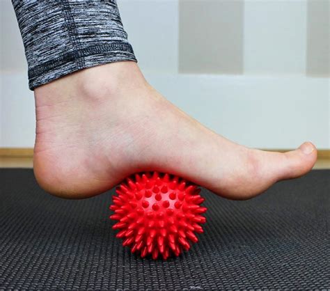 The lower end of the leg of a chair or table. Spiked Ball Foot and Body Massager