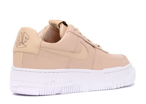 A geometric rendering of nike and af1 logos appear on the shoe's tongue tag, heel counter and insole. AIR FORCE 1 PIXEL PARTICLE BEIGE (W) | Level Up