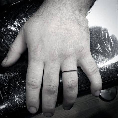 Besides tattoos on the finger sides, there are also finger tattoos for men near the knuckle, covering part or the entire finger. 75 Finger Tattoos For Men - Manly Design Ideas