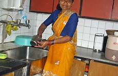 house maid cleaning kitchen india utensils domestic woman worker feminist stock work