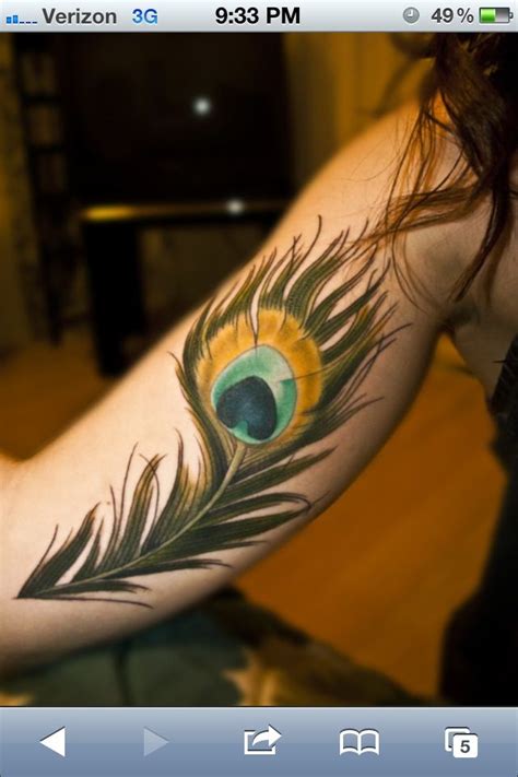 The blade almost seems like it's disappearing. peacock detail | Peacock feather tattoo, Peacock tattoo, Feather tattoos