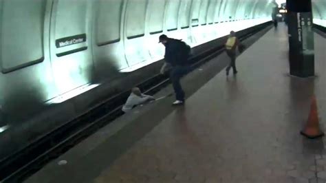 Under desk hidden cam caught my mum fingering her pussy. Caught on cam: Man who fell on subway tracks is pulled to ...