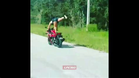 How to lift a motorcycle's rear wheel without a stand a bonus video here showing how i left the rear wheel of my. Girl lifts her leg off motorcycle - YouTube