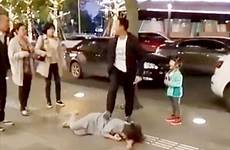 man wife cheating chinese beats his crying young daughter middle street beat shocking then moment shows their who online front