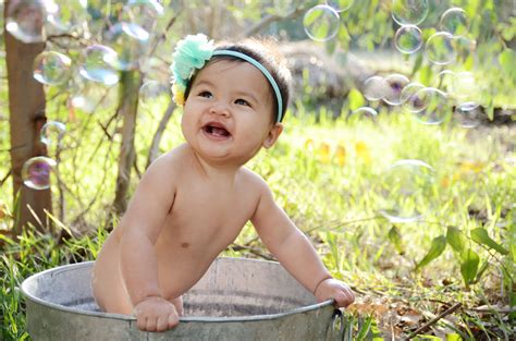 Woman washing leg with pink sponge. Outdoor Bubble Bath Photos 9 Month Baby Photography_3324 ...