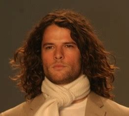 The top portion of the hair is cut in longer manner and lifted upward. sexy men long shaggy hairstyle with curls.jpg (3 comments)