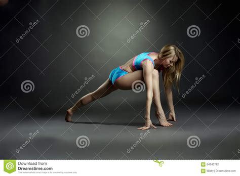 This list is the only resource you'll ever need to find stretch exercises for all your body dynamic stretching is an active type of stretching where you do not hold the stretches but you would stretch with movement. Blonde Doing Stretching Exercises In Studio Stock Photo ...